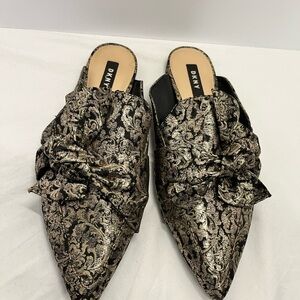 DKNY Women's Black and Gold Slip-On Shoes